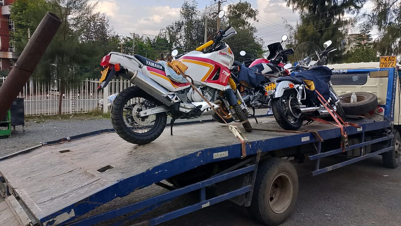 Heavy duty tow truck recovering large commercial vehicle