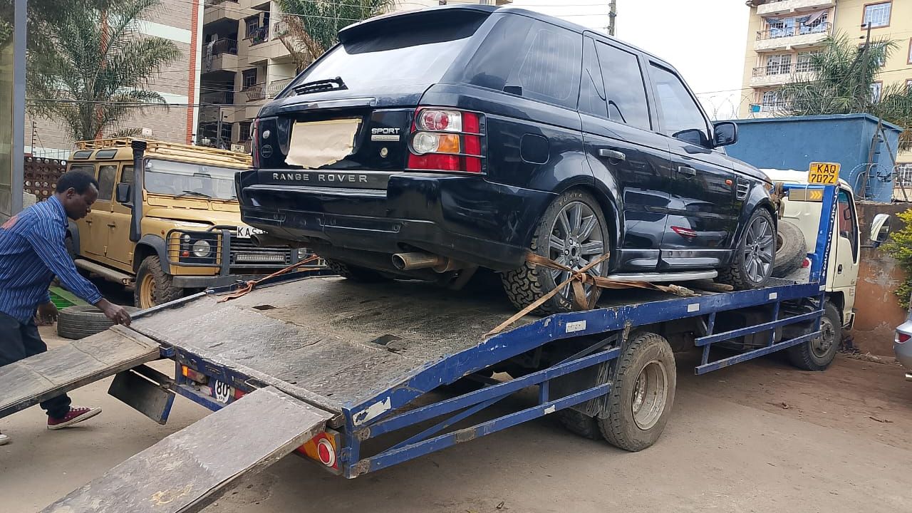 Accident recovery team working at crash scene