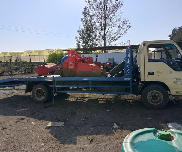 Professional long distance towing service in Kenya transporting vehicles